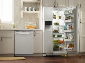 Image of a kitchen with an open refrigerator